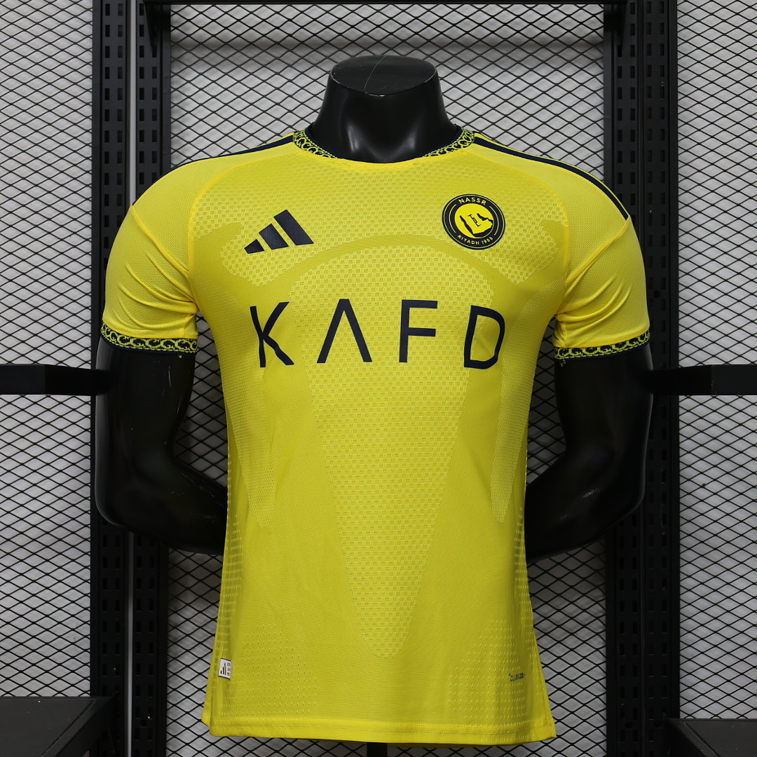 Al Nassr 26-27 Al-Nassr Victory Home Soccer Jersey Player Version with Sponsor vs The Original: A Detailed Comparison